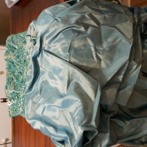 Beautiful blue-green iridescent beaded gown by Jovani